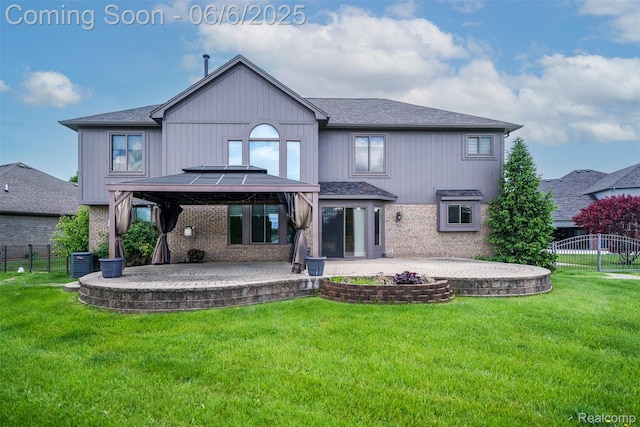 42105 Dorchester Ct, Clinton Township, MI 48038 - back of house featuring brick siding, a patio area, central air condition unit, and a shingled roof