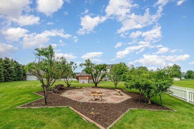424 Gale Ct, Ithaca, MI 48847 - view of yard with an outdoor fire pit