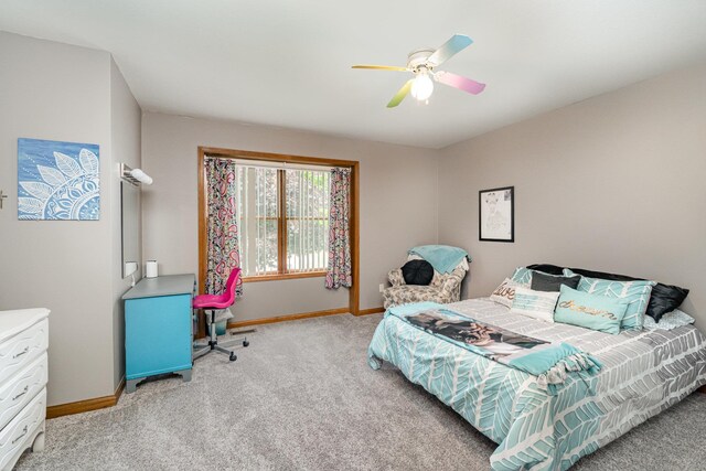 424 Gale Ct, Ithaca, MI 48847 - bedroom with light carpet, baseboards, and ceiling fan
