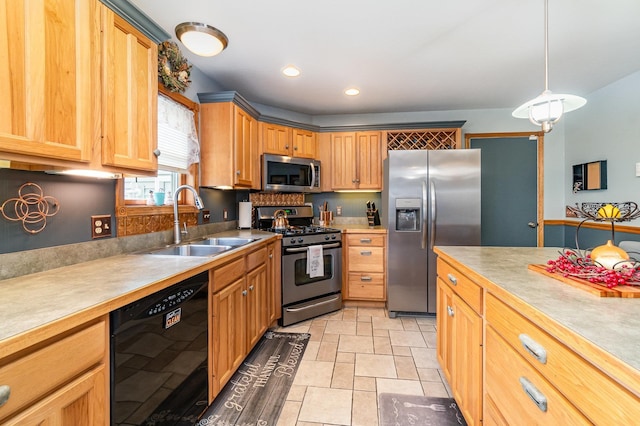 424 Gale Ct, Ithaca, MI 48847 - kitchen featuring stainless steel appliances, a sink, pendant lighting, light countertops, and recessed lighting