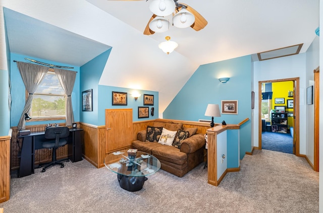 424 Gale Ct, Ithaca, MI 48847 - living room featuring carpet floors, a desk, a wainscoted wall, a ceiling fan, and wooden walls