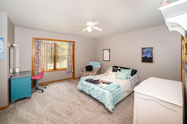 424 Gale Ct, Ithaca, MI 48847 - bedroom featuring light colored carpet, baseboards, and a ceiling fan