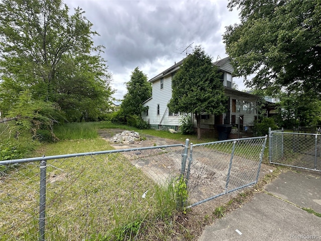 17184 Mackay St, Detroit, MI 48212 - view of home's exterior with a gate