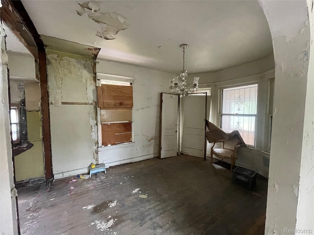 17184 Mackay St, Detroit, MI 48212 - unfurnished dining area with hardwood / wood-style floors and a chandelier