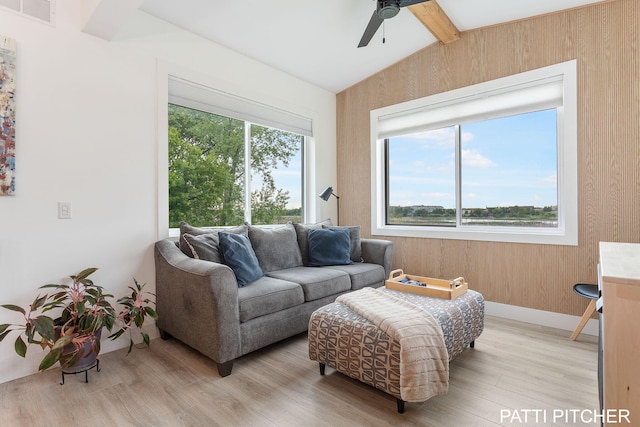 104 River Hills Dr, Holland, MI 49424 - living area with a ceiling fan, beamed ceiling, and light wood-style floors