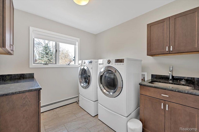 61381 Miriam Dr, Washington, MI 48094 - washroom featuring a baseboard radiator, cabinet space, independent washer and dryer, light marble finish flooring, and bar with sink