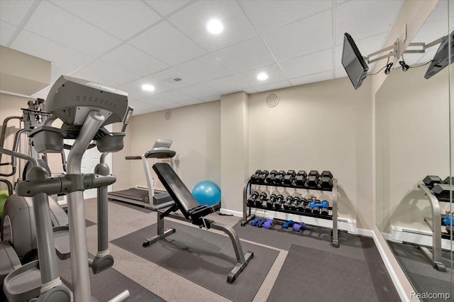 61381 Miriam Dr, Washington, MI 48094 - workout area featuring a paneled ceiling, recessed lighting, and baseboards