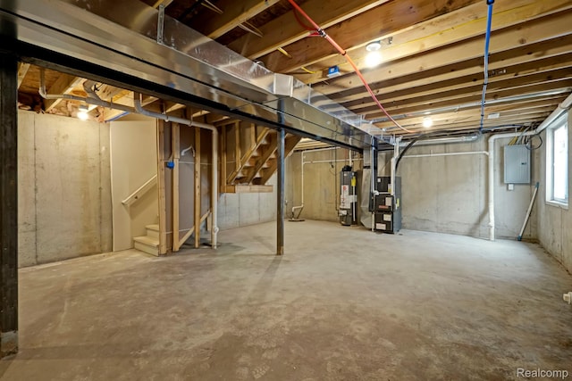 534 E Brickley Ave, Hazel Park, MI 48030 - basement featuring electric panel, heating unit, stairs, and gas water heater