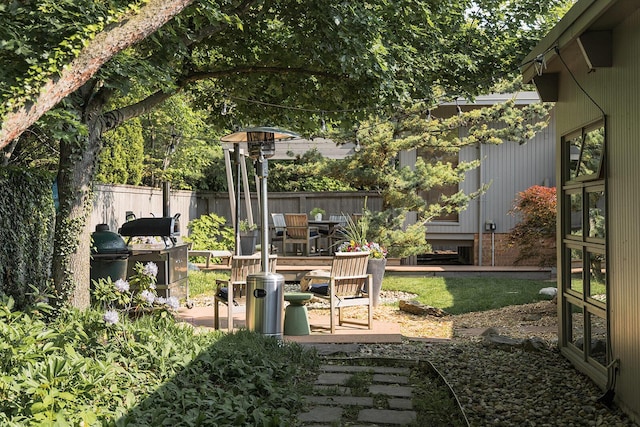 35 Fultonwood Dr SE, Grand Rapids, MI 49503 - view of yard featuring a patio area