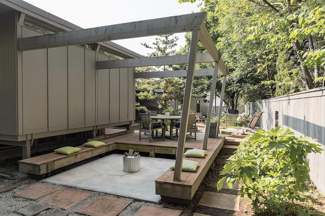 35 Fultonwood Dr SE, Grand Rapids, MI 49503 - view of patio with outdoor dining space and a wooden deck