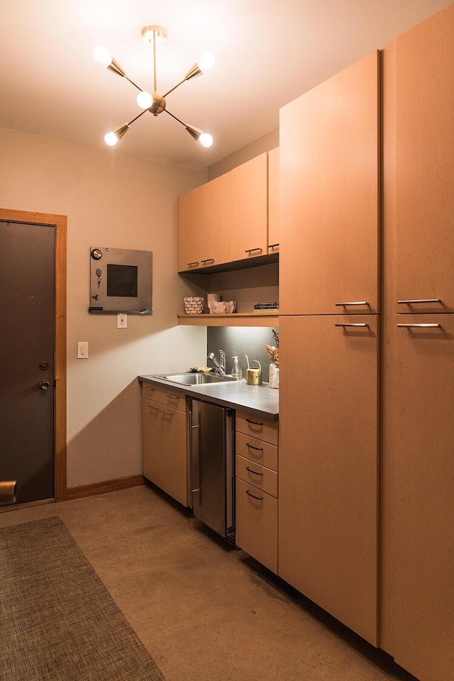 35 Fultonwood Dr SE, Grand Rapids, MI 49503 - kitchen with a sink, a chandelier, and open shelves