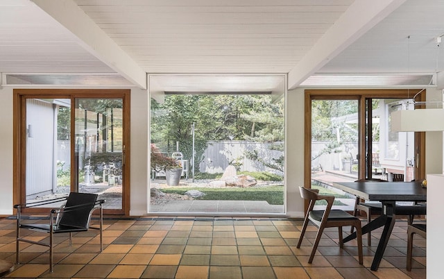 35 Fultonwood Dr SE, Grand Rapids, MI 49503 - sunroom / solarium with beam ceiling, plenty of natural light, and tile patterned floors
