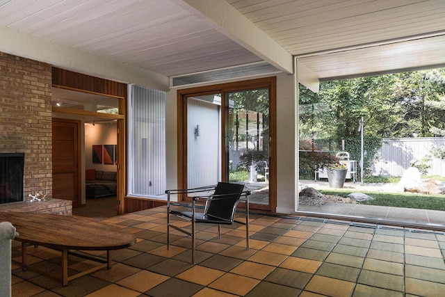 35 Fultonwood Dr SE, Grand Rapids, MI 49503 - sunroom / solarium with tile patterned flooring and beamed ceiling