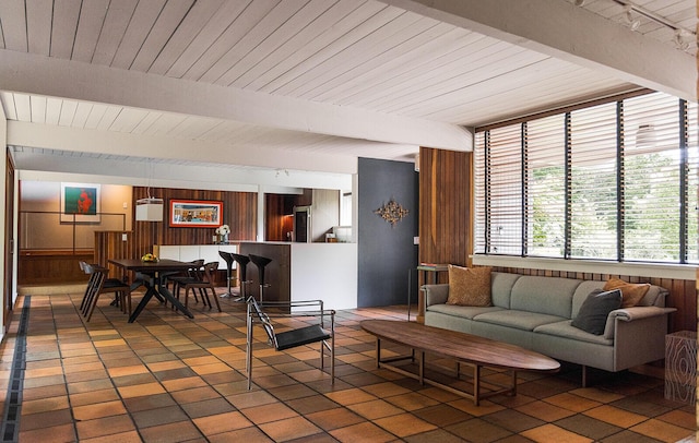 35 Fultonwood Dr SE, Grand Rapids, MI 49503 - living area with wooden walls, wooden ceiling with exposed beams, and track lighting