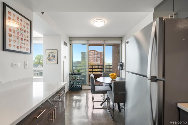 3320 Spinnaker Ln Unit 4A, Detroit, MI 48207 - dining room featuring concrete floors