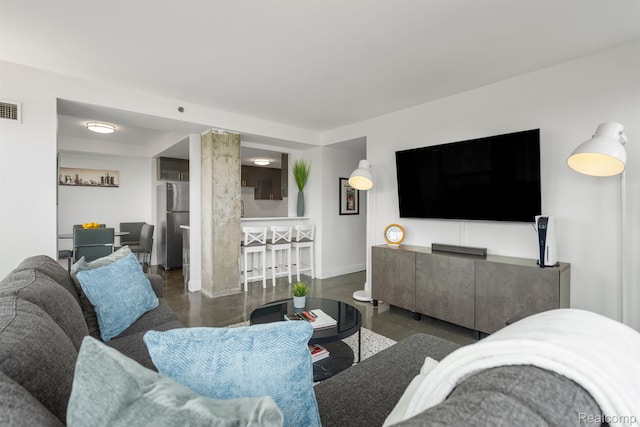 3320 Spinnaker Ln Unit 4A, Detroit, MI 48207 - living area featuring finished concrete flooring and baseboards