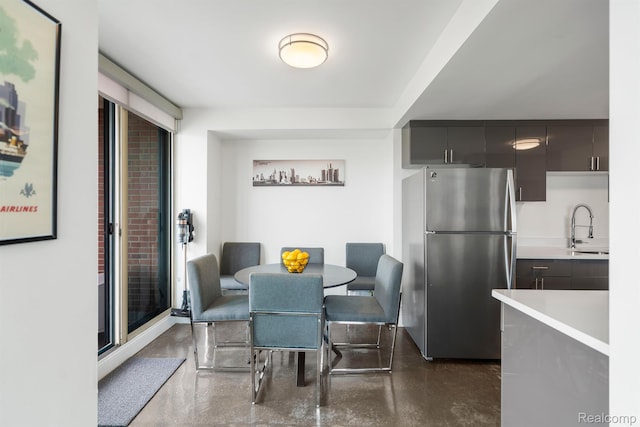 3320 Spinnaker Ln Unit 4A, Detroit, MI 48207 - dining area with concrete floors