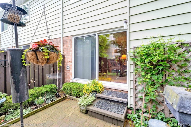 1874 Wickham St Unit 68, Royal Oak, MI 48073 - doorway to property with a patio