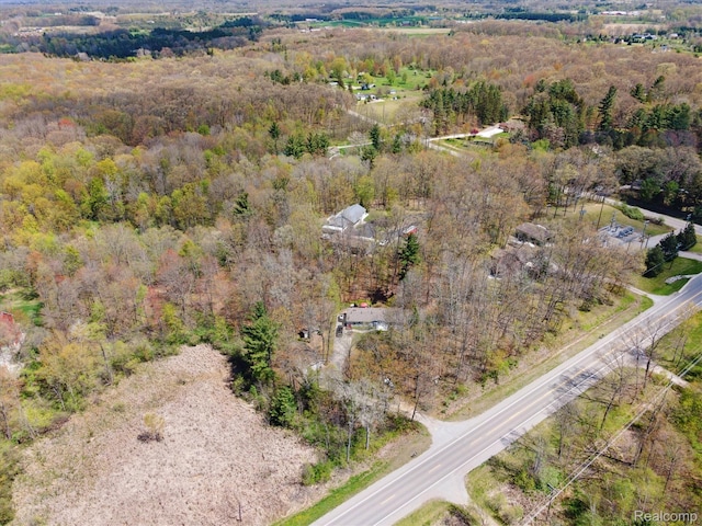 4952 Davison Rd, Lapeer, MI 48446 - aerial view of property and surrounding area featuring a forest
