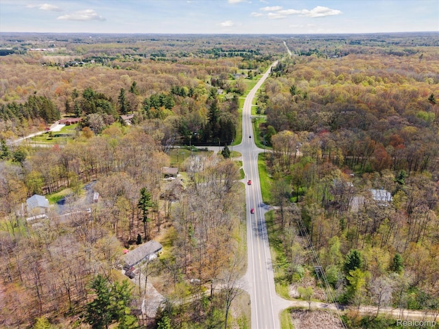 4952 Davison Rd, Lapeer, MI 48446 - aerial overview of property's location featuring a heavily wooded area