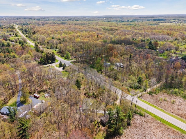 4952 Davison Rd, Lapeer, MI 48446 - aerial overview of property's location with a heavily wooded area