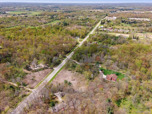 4952 Davison Rd, Lapeer, MI 48446 - aerial overview of property's location with a forest