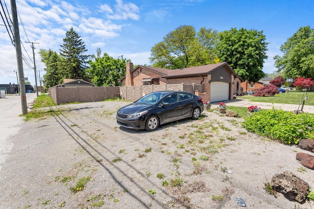 3244 Dearborn St, Wayne, MI 48184 - view of front facade with a garage and brick siding
