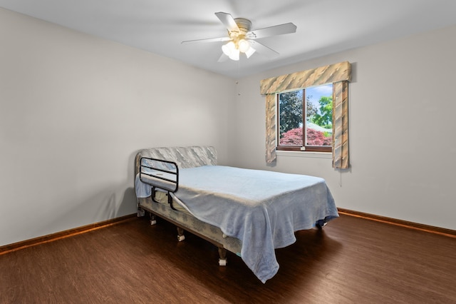 3244 Dearborn St, Wayne, MI 48184 - bedroom with wood finished floors, baseboards, and ceiling fan