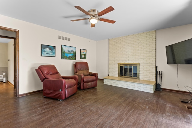 3244 Dearborn St, Wayne, MI 48184 - living area with wood finished floors, ceiling fan, baseboards, and a fireplace