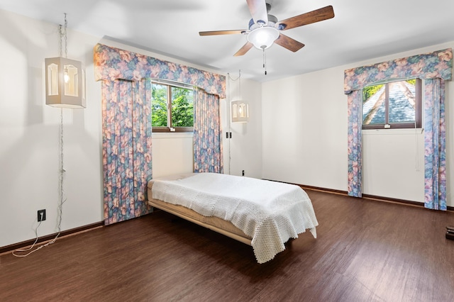 3244 Dearborn St, Wayne, MI 48184 - bedroom with wood finished floors, baseboards, and ceiling fan