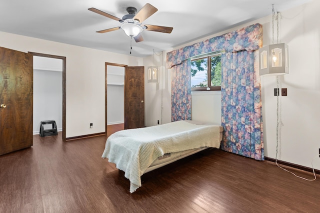 3244 Dearborn St, Wayne, MI 48184 - bedroom with wood finished floors, baseboards, and a ceiling fan