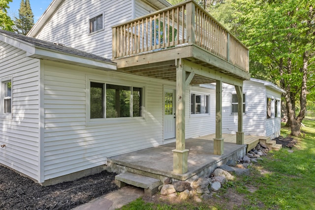 17465 Rapids Dr, Hersey, MI 49639 - rear view of property with a wooden deck