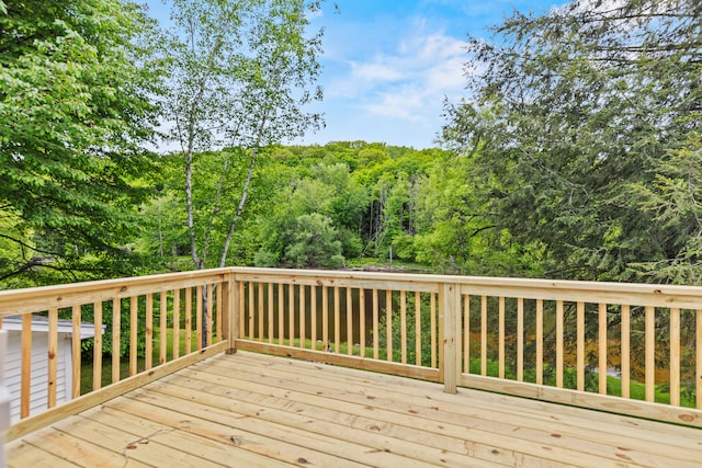 17465 Rapids Dr, Hersey, MI 49639 - wooden terrace featuring a forest view
