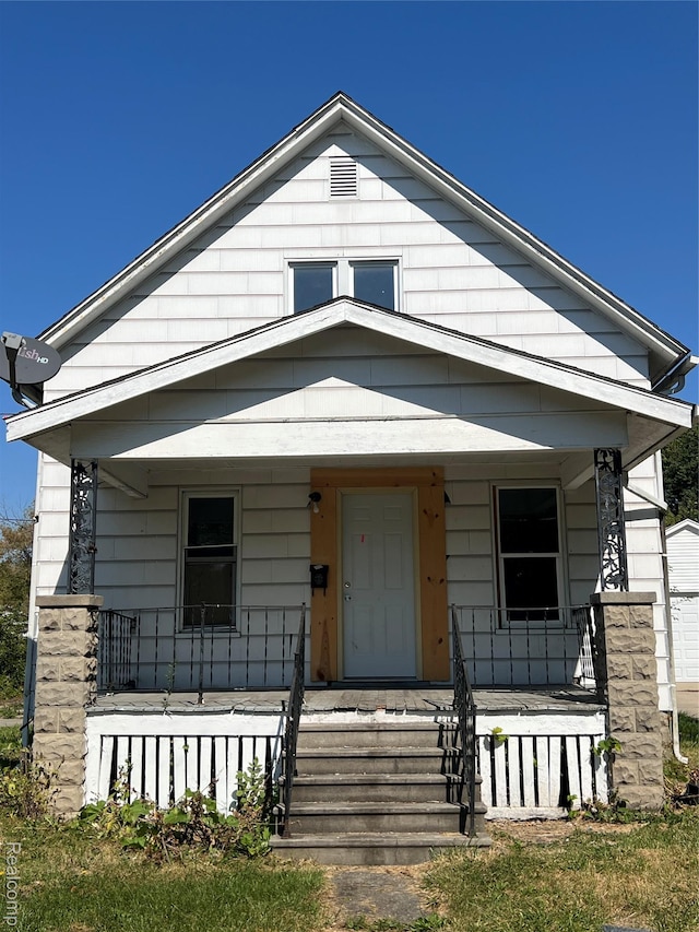 1756 Jordan St, Saginaw, MI 48602 - view of front of home featuring covered porch