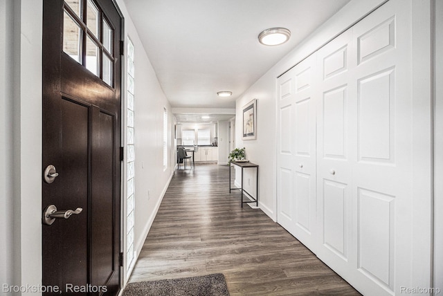 3012 Lansdowne Rd, Waterford, MI 48329 - corridor featuring baseboards and dark wood-style flooring