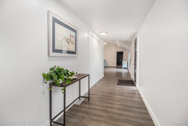 3012 Lansdowne Rd, Waterford, MI 48329 - corridor featuring baseboards, wood finished floors, and vaulted ceiling