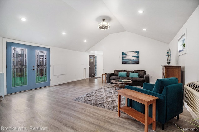 3012 Lansdowne Rd, Waterford, MI 48329 - living area featuring lofted ceiling, french doors, wood finished floors, and recessed lighting