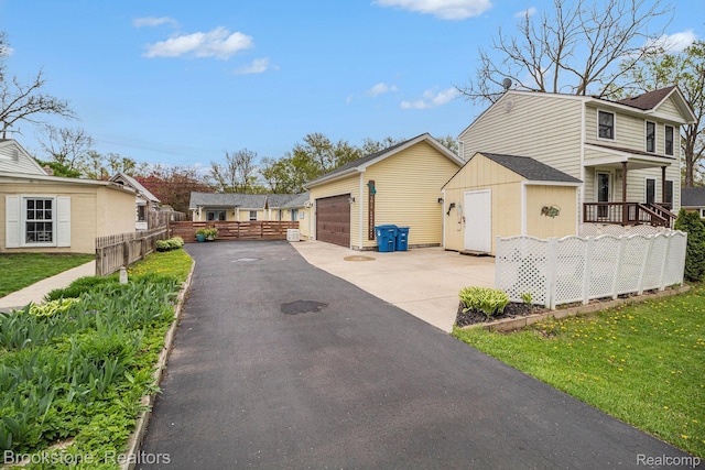 3012 Lansdowne Rd, Waterford, MI 48329 - view of front of house with an outbuilding