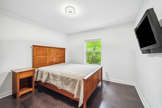4085 Ravina Ter, Saint Joseph, MI 49085 - bedroom with dark wood finished floors and baseboards