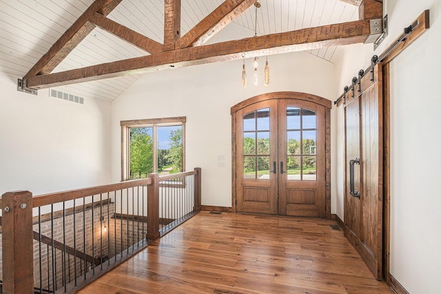4035 136th Ave, Hamilton, MI 49419 - foyer with a barn door, wood-type flooring, baseboards, wooden ceiling with exposed beams, and high vaulted ceiling