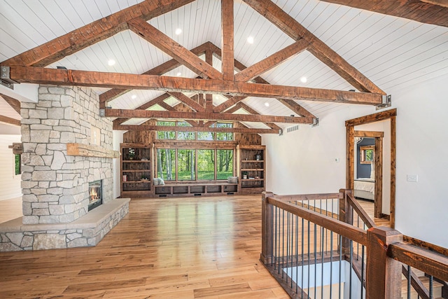 4035 136th Ave, Hamilton, MI 49419 - unfurnished living room with hardwood / wood-style floors, wood ceiling, a fireplace, and recessed lighting