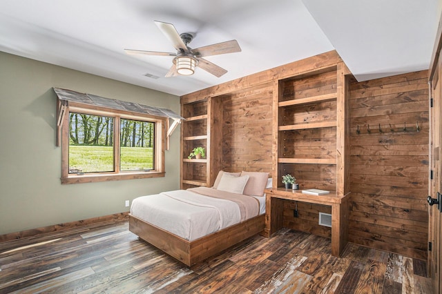 4035 136th Ave, Hamilton, MI 49419 - bedroom featuring wood walls, dark wood-type flooring, baseboards, and a ceiling fan
