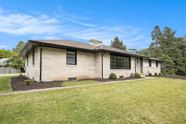 906 Wilshire Blvd, Kalamazoo, MI 49008 - single story home with a chimney, a shingled roof, and stone siding