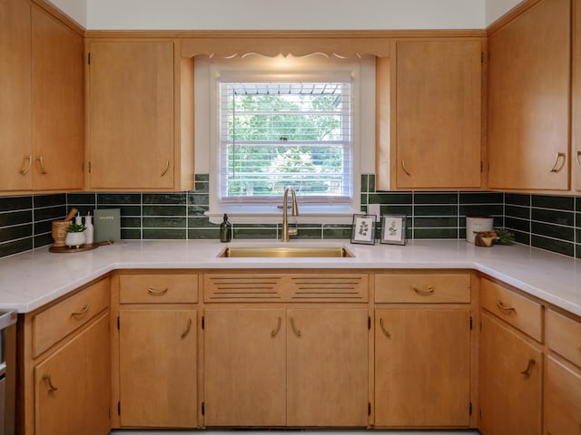 906 Wilshire Blvd, Kalamazoo, MI 49008 - kitchen with light countertops and backsplash