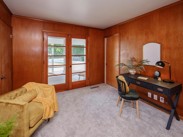 906 Wilshire Blvd, Kalamazoo, MI 49008 - carpeted home office featuring wooden walls, ornamental molding, and french doors