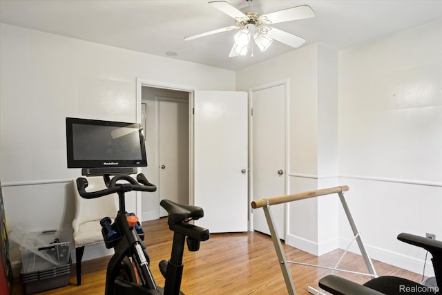 1220 Minglewood Way, Ann Arbor, MI 48103 - workout room featuring wood finished floors, a ceiling fan, and baseboards