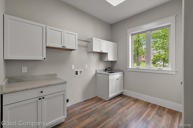 1760 Hamilton Dr, Bloomfield Hills, MI 48302 - washroom featuring cabinet space, dark wood-type flooring, washer hookup, and baseboards