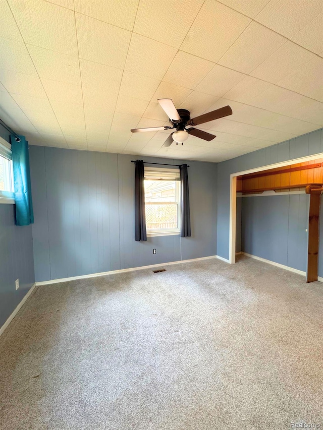 14070 Nadine St, Oak Park, MI 48237 - unfurnished bedroom featuring carpet, baseboards, and ceiling fan