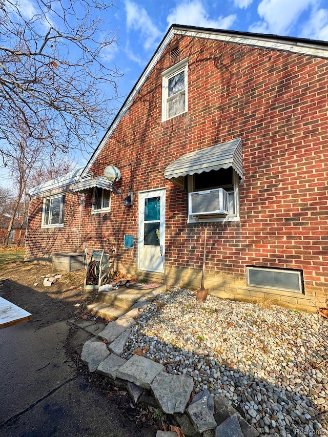 14070 Nadine St, Oak Park, MI 48237 - view of front of property featuring brick siding and cooling unit