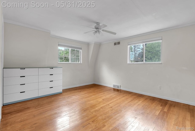 2408 Otter St, Warren, MI 48092 - unfurnished bedroom featuring light wood-style floors, baseboards, crown molding, and ceiling fan